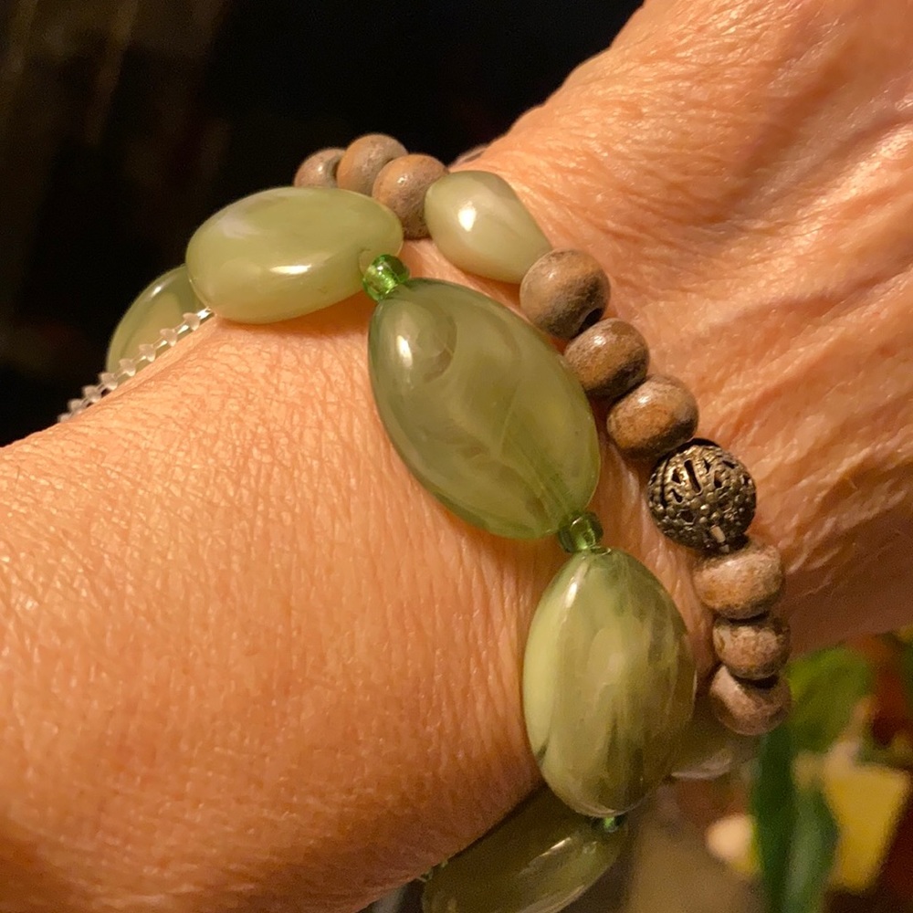 Two Stretch green costume bracelet.